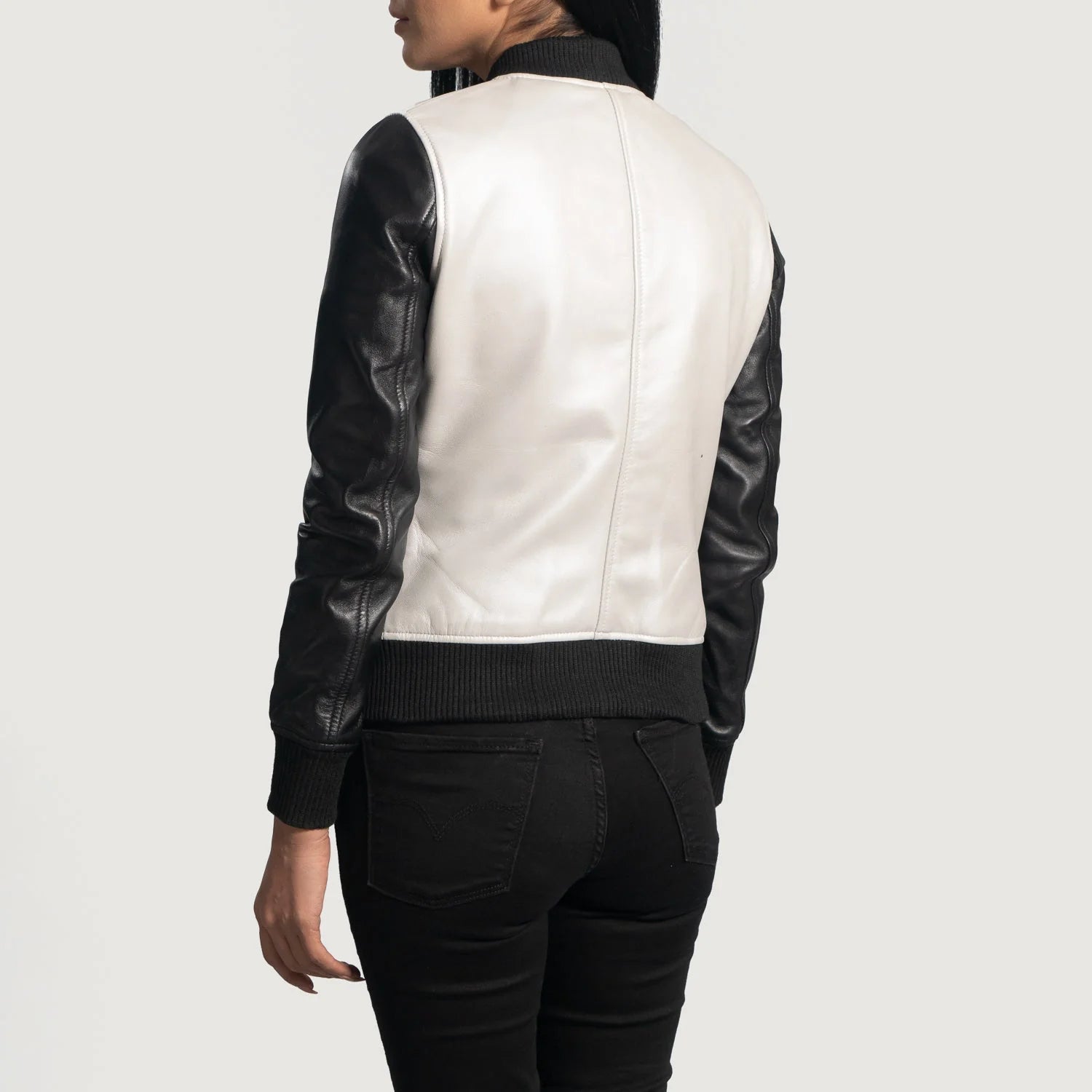 Lush Gear silver leather bomber jacket with black sleeves worn by model from back view