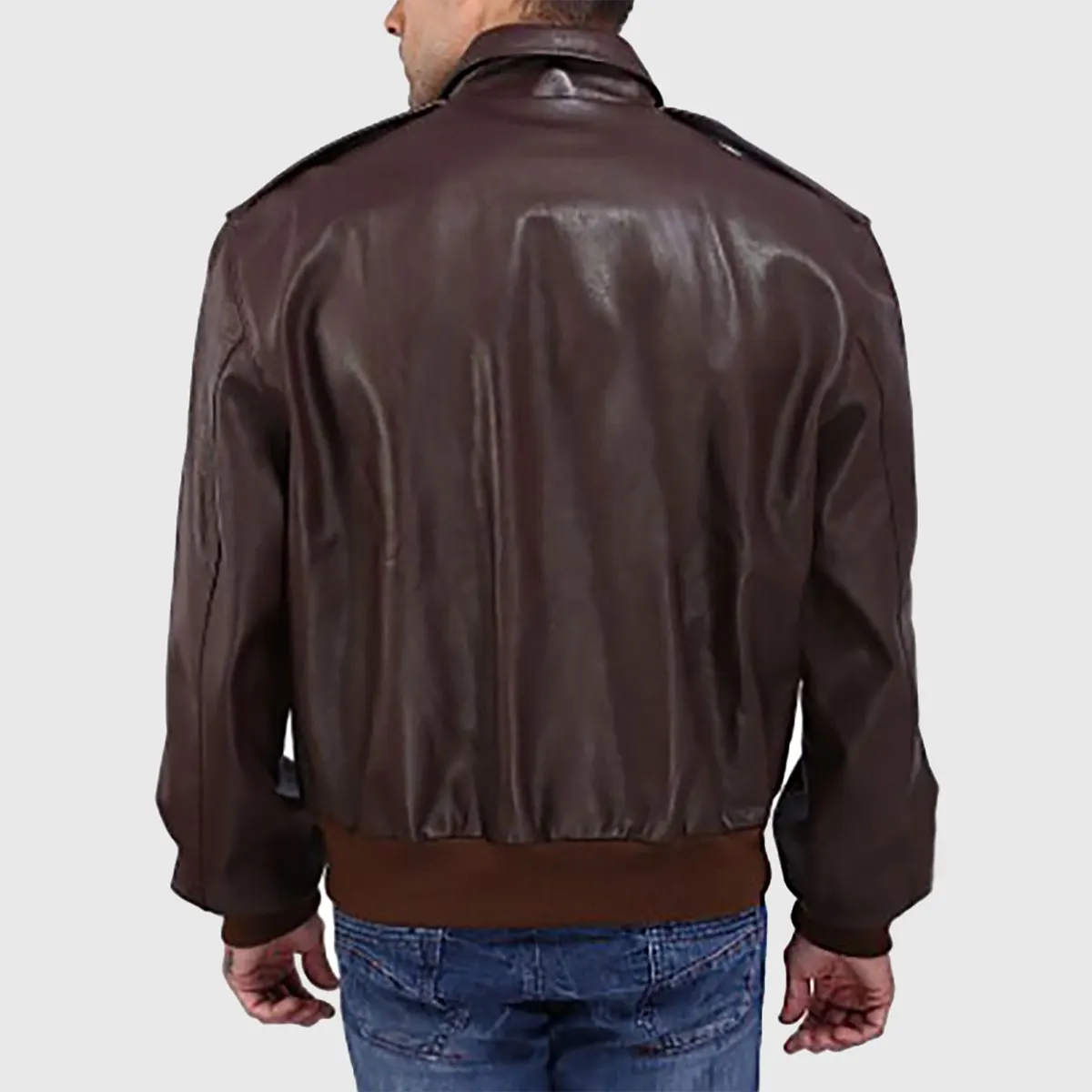 Back view of a brown leather A-2 bomber jacket for men by Lush Gear with ribbed cuffs and waistband