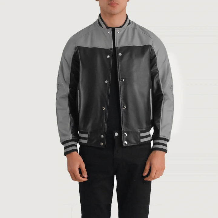 Lush Gear black and grey leather varsity jacket with snap buttons and striped collar cuffs