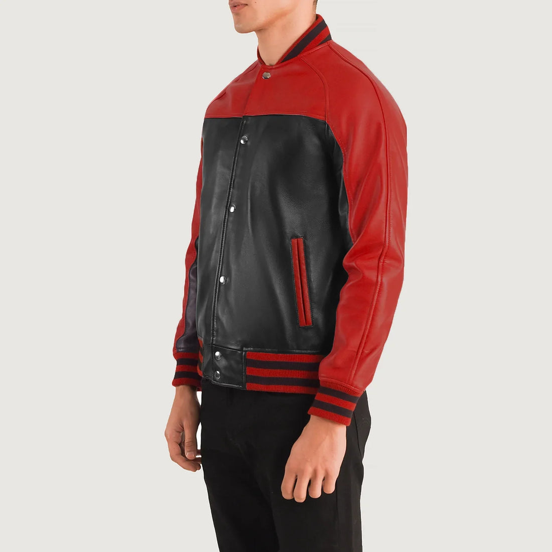 Lush Wear black and red leather varsity jacket with snap buttons and striped cuffs on male model