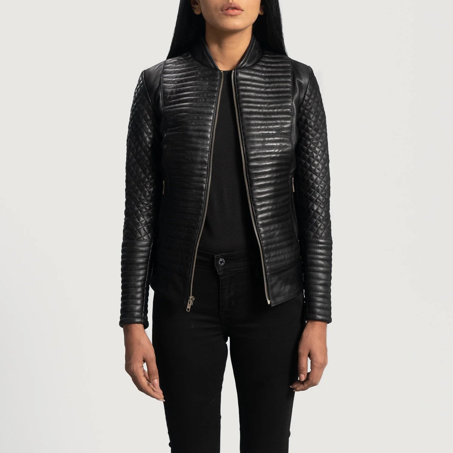 Lush Gear black leather biker jacket with quilted sleeves and front zipper on model
