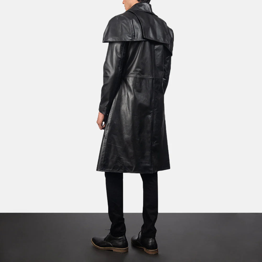 Man wearing black leather duster coat standing with back to the camera showing coat details