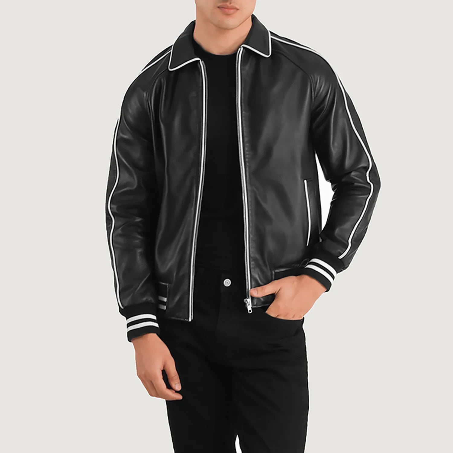 Lush Gear black leather varsity jacket with white piping and striped cuffs worn by male model