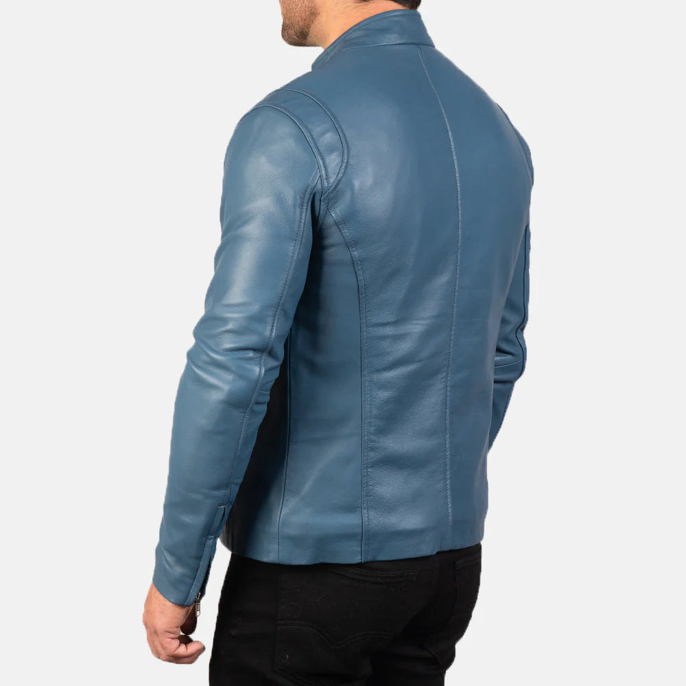 Back view of a man wearing a blue leather biker jacket by Lush Gear with detailed stitching and fitted design