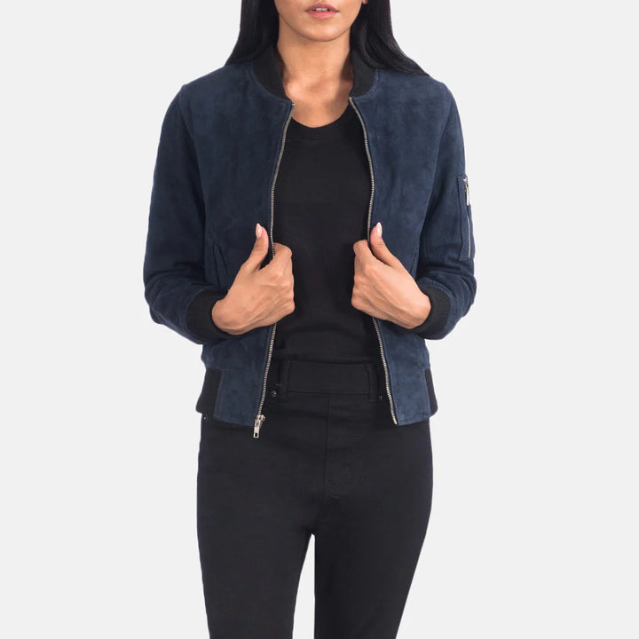 Lush Wear blue suede bomber jacket worn by woman with black pants and black shirt