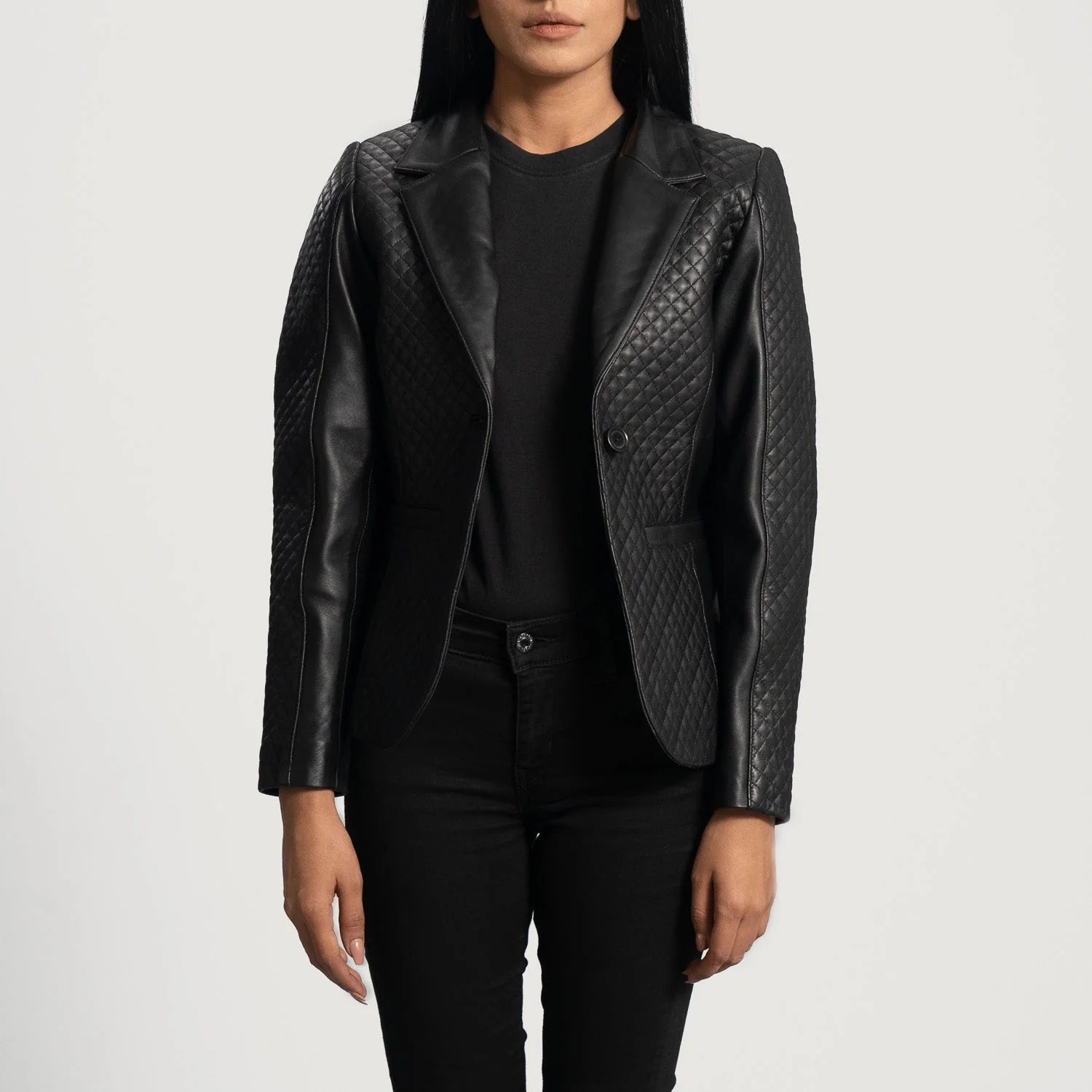 Cora Quilted Black Leather Blazer by Lush Wear modeled on woman with quilted sleeves and tailored fit