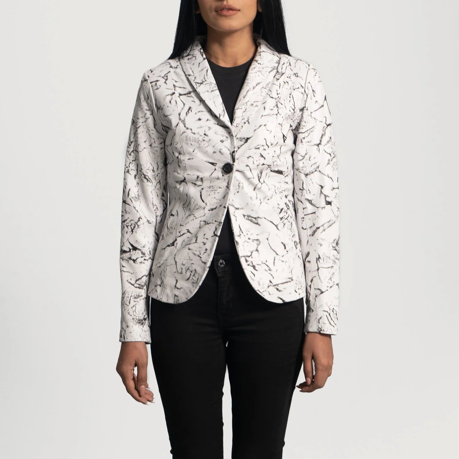 Donna Blake White Leather Blazer with black marble pattern worn with black pants