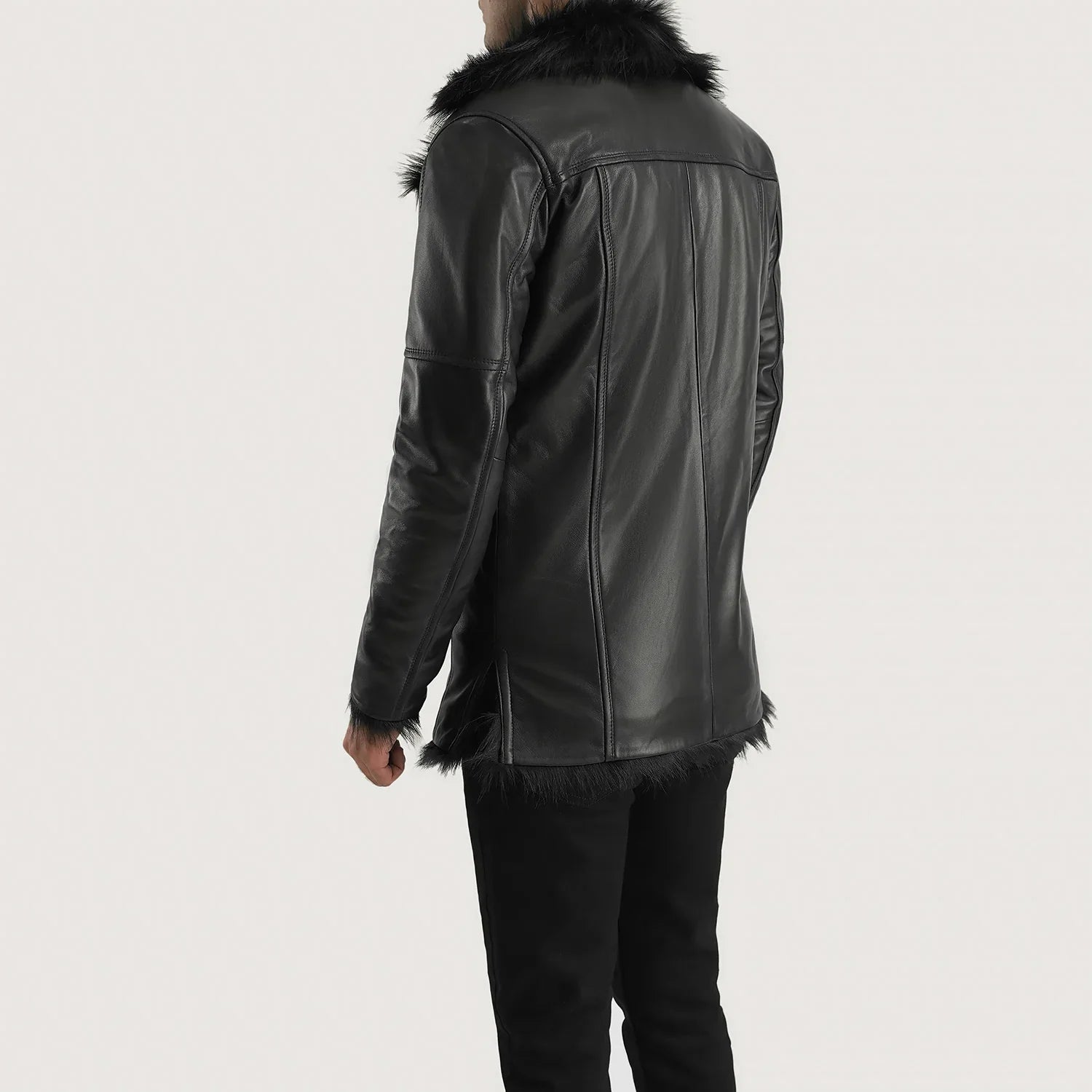 Back view of Furcliff Black Leather Coat with fur collar and trim worn by model