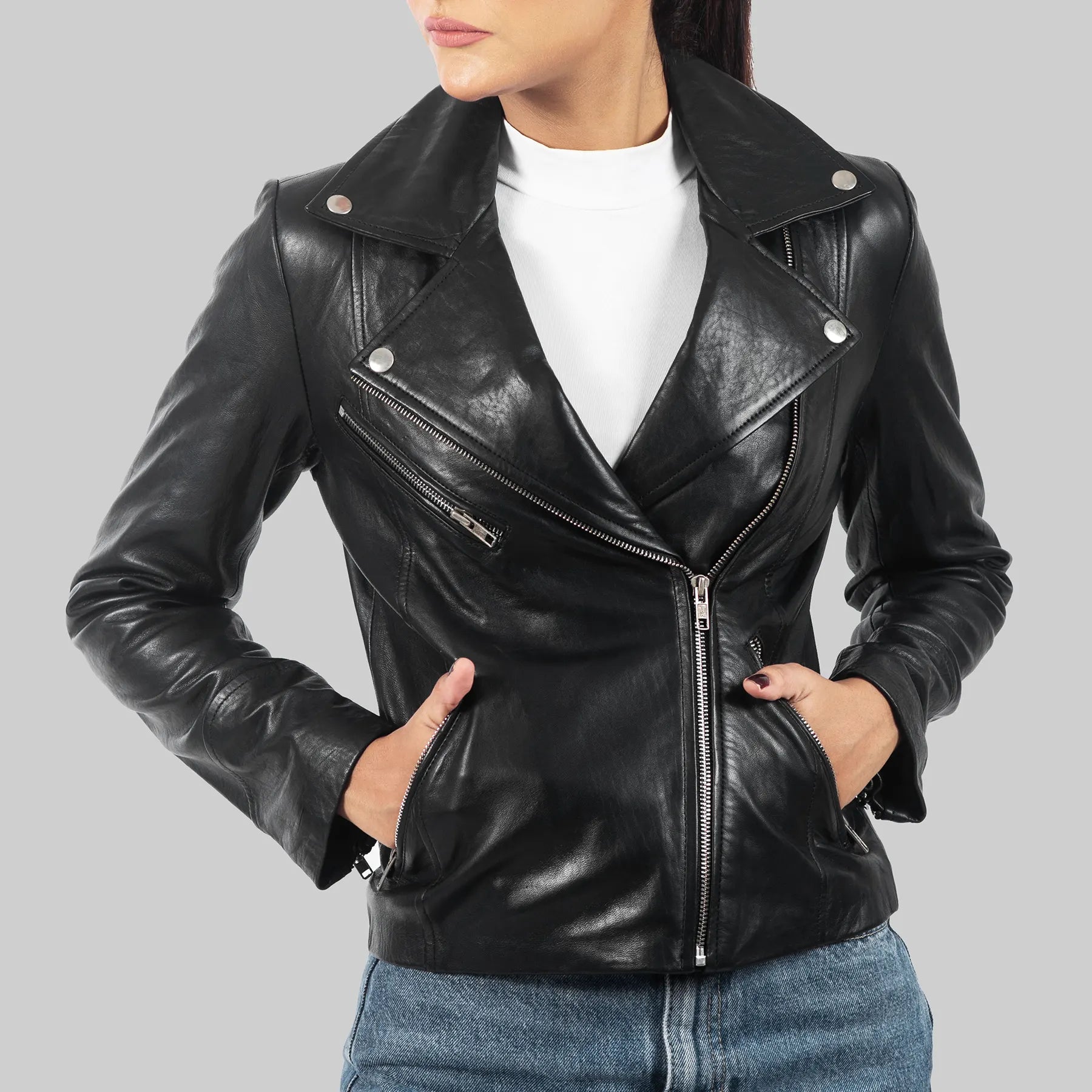 Black leather motorcycle jacket for women with zippered pockets and silver hardware by Lush Gear