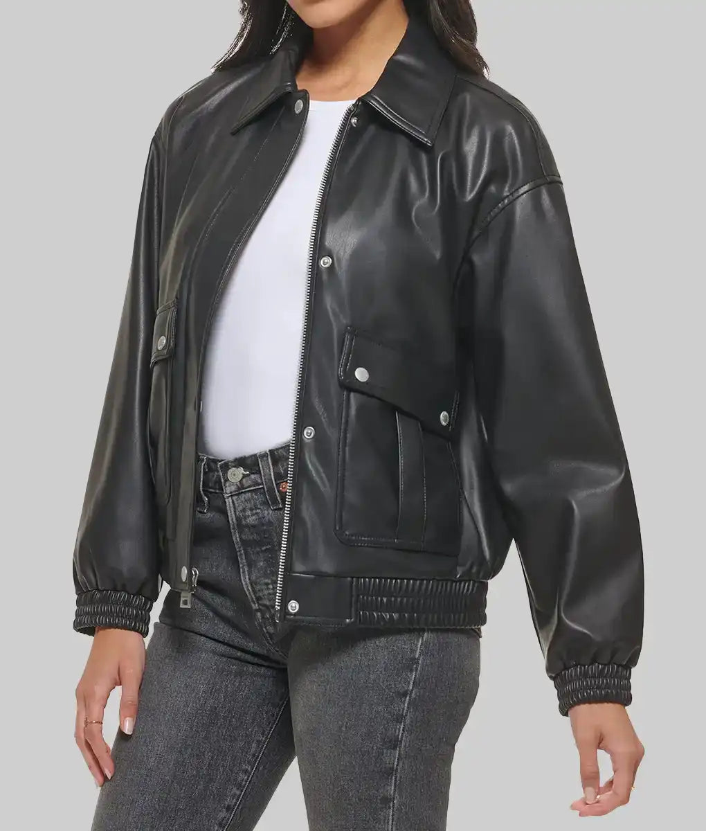 Black leather varsity jacket for women from Lush Gear with front zipper and snap pockets