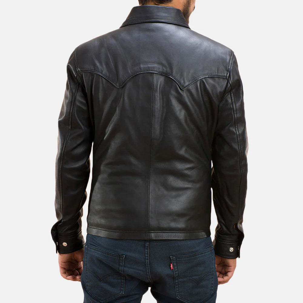 Back view of men's black leather shirt by Lush Gear showing detailed stitching and buttoned cuffs