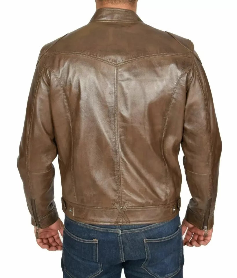 Back view of men's brown leather biker jacket by Lush Wear paired with blue jeans