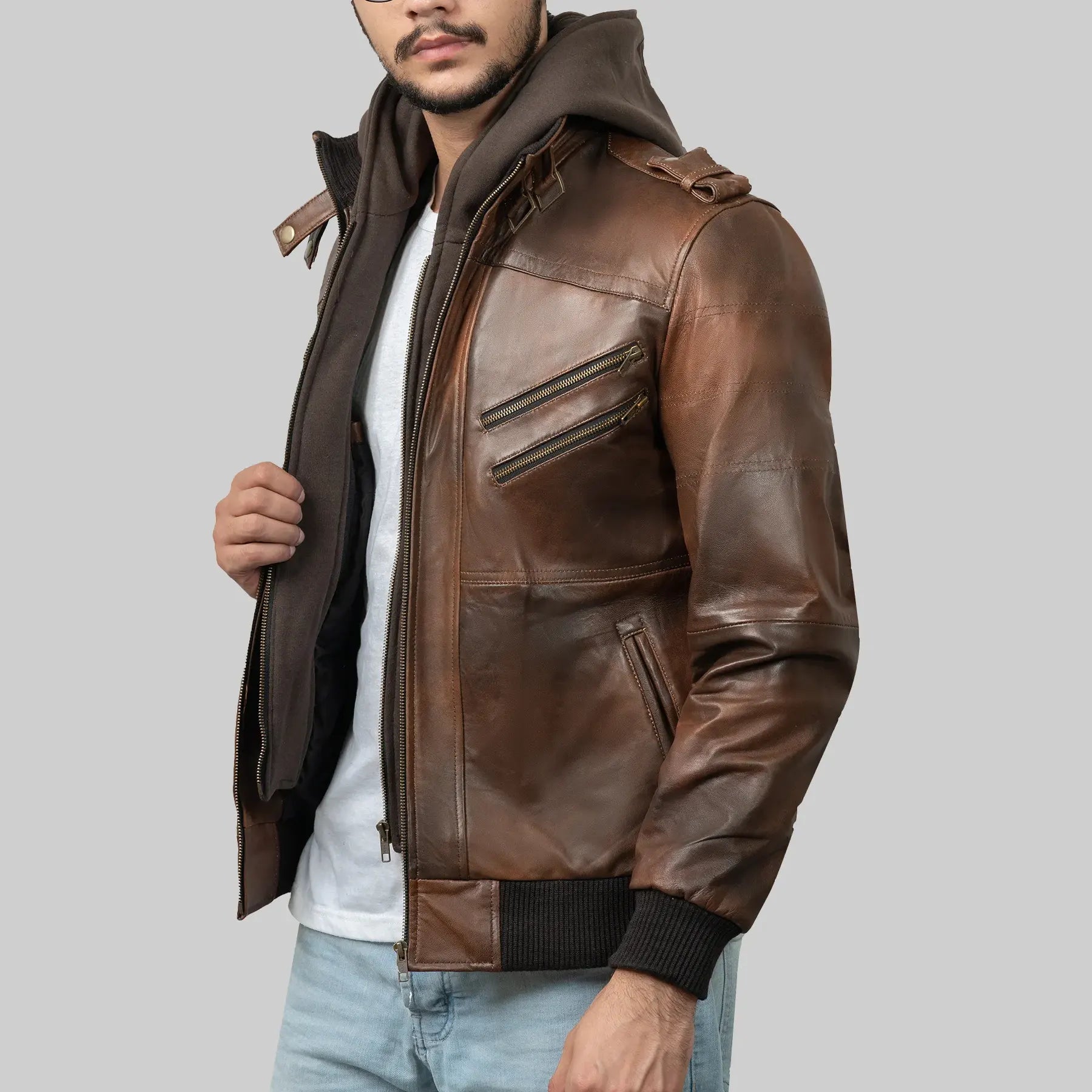 Lush Gear men's brown leather biker jacket with zippered pockets and ribbed cuffs on model