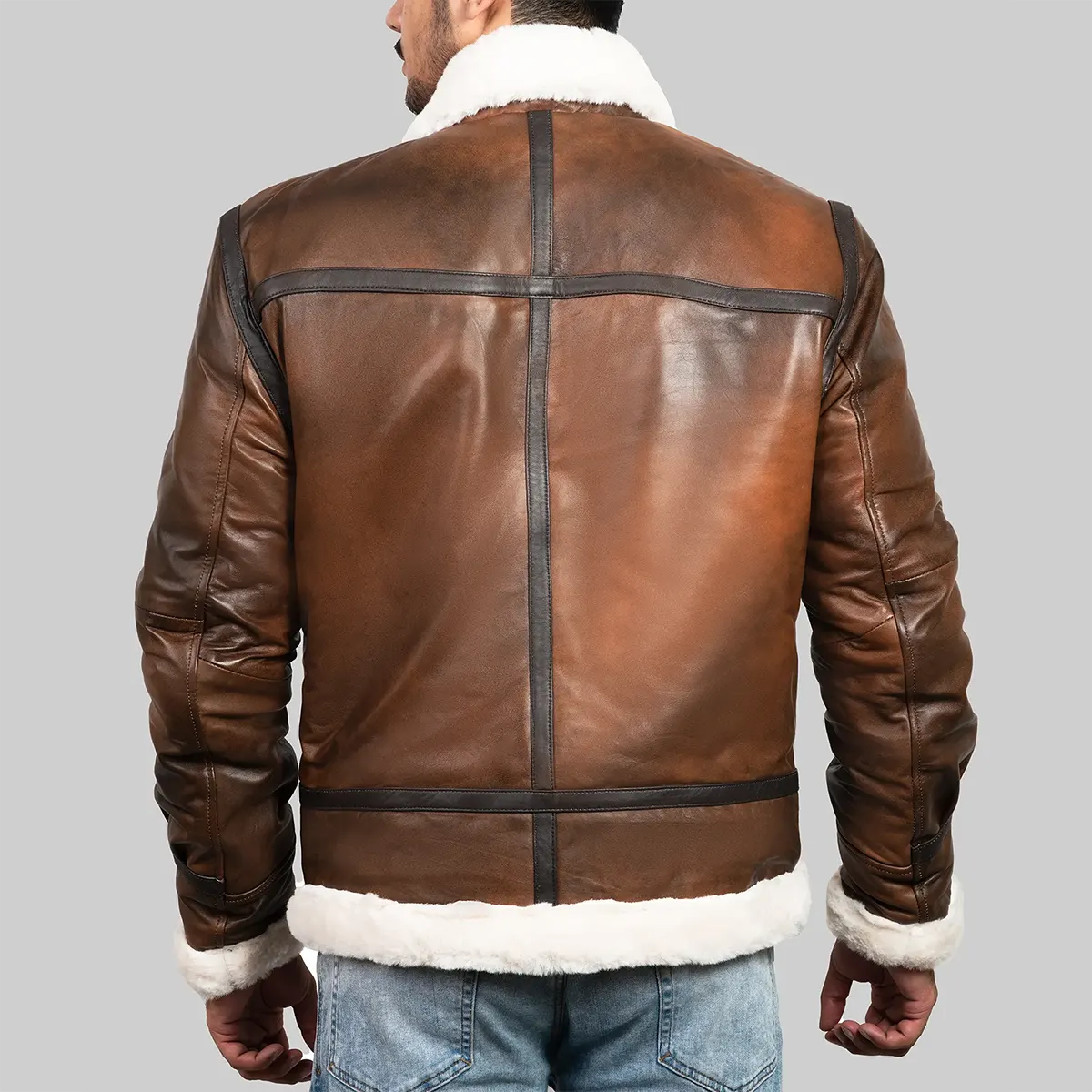 Back view of men's brown shearling jacket with white fur collar and cuffs by Lush Gear