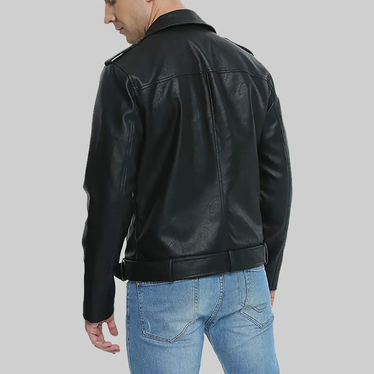 Back view of men's distressed black leather biker jacket by Lush Gear worn with blue jeans