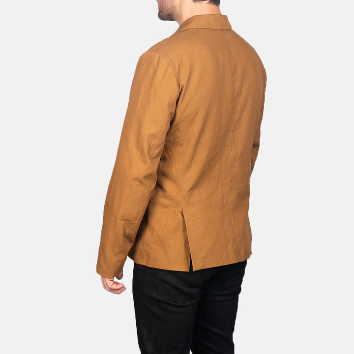 Back view of a men's khaki safari jacket by Lush Gear worn with black pants