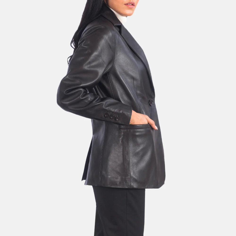 Side view of a woman wearing Norma Brown Leather Blazer with long sleeves and button details