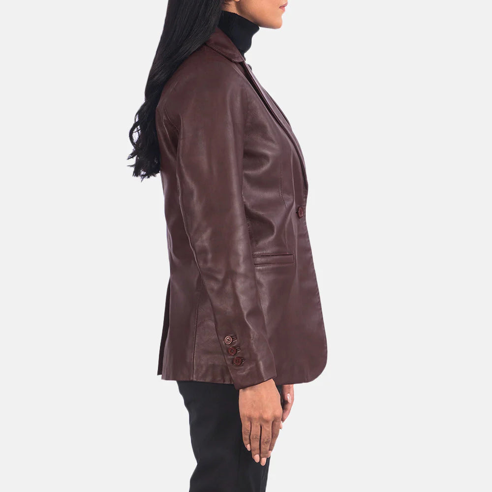 Side view of woman wearing Norma Maroon Leather Blazer by Lush Gear with buttoned cuffs and tailored fit