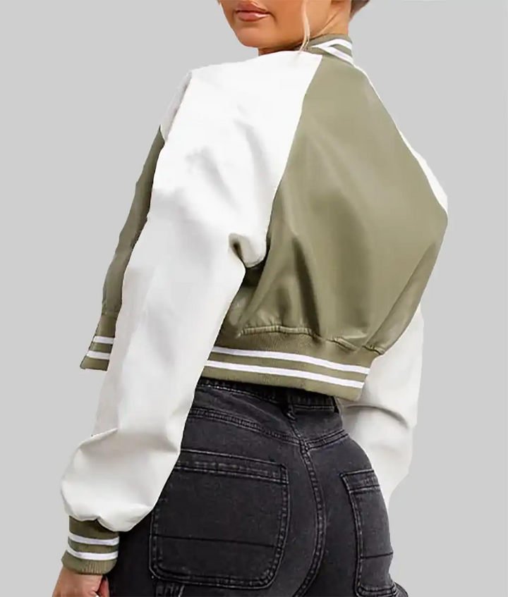 Women wearing an olive white varsity bomber jacket with striped cuffs and waistband by Lush Gear