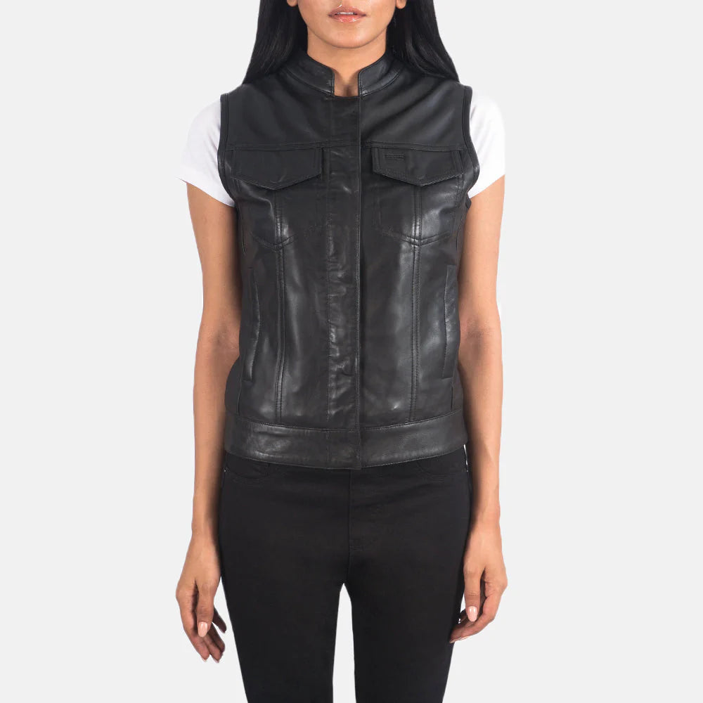 Rayne Moto Black Leather Vest by Lush Gear modeled over a white t-shirt with front pockets and zip closure