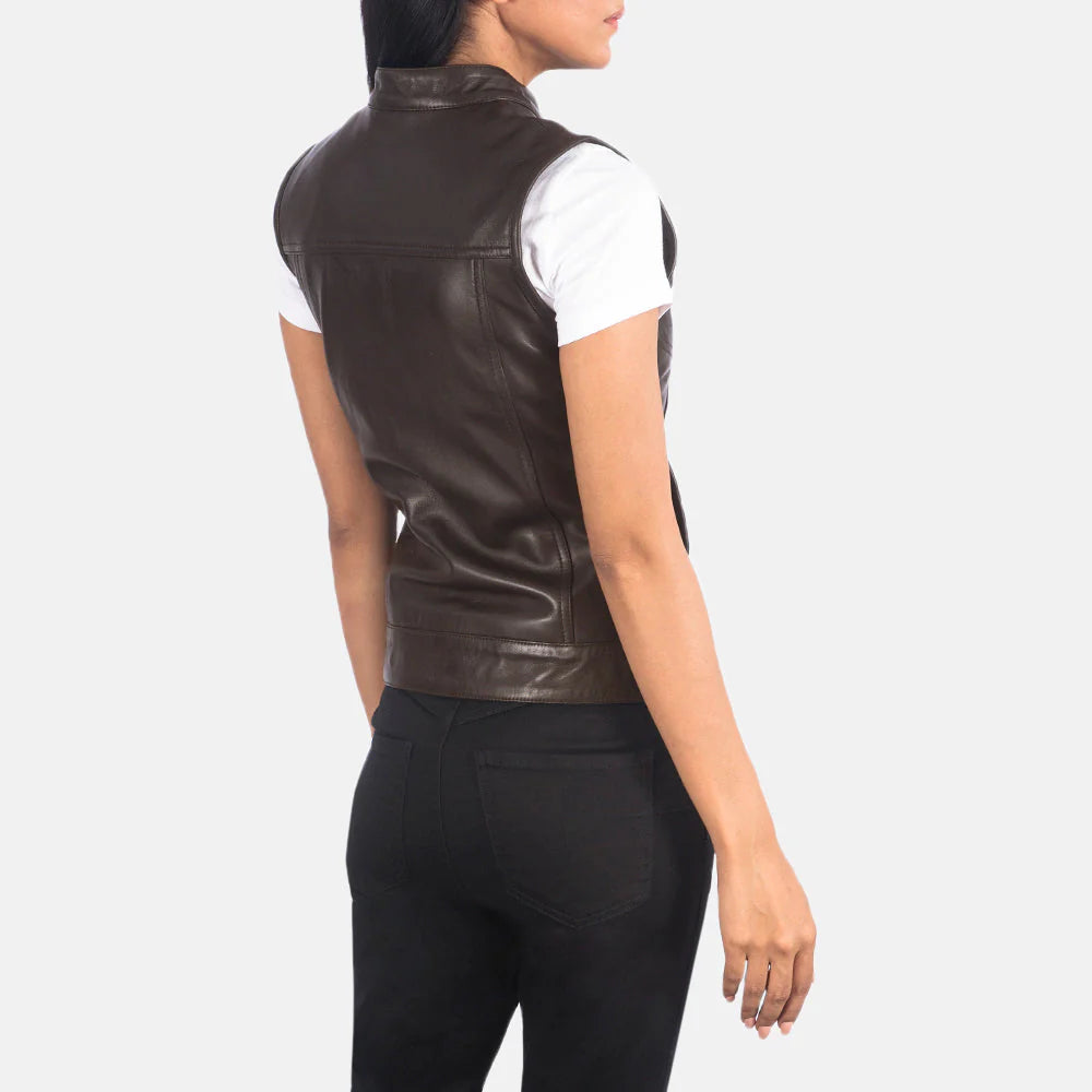 Back view of woman wearing Rayne Moto Brown Leather Vest by Lush Wear over white shirt and black pants