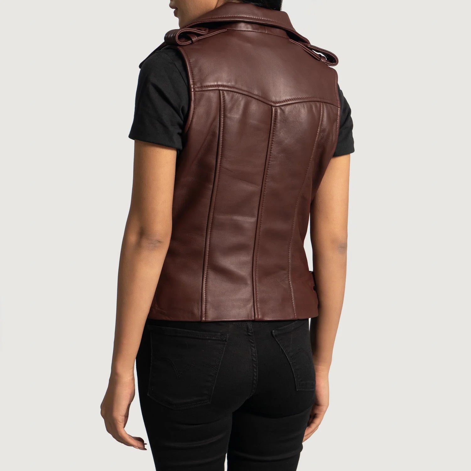 Back view of Rhonda Maroon Leather Biker Vest worn over black t-shirt with black pants