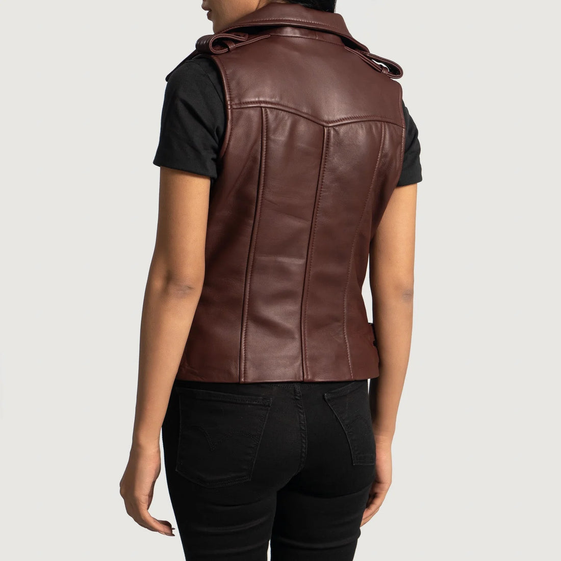 Back view of Rhonda Maroon Leather Biker Vest worn over black t-shirt with black pants