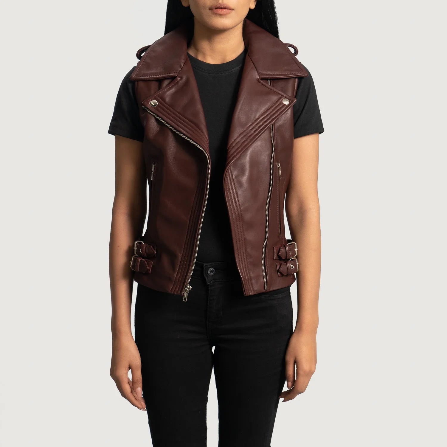 Rhonda Maroon Leather Biker Vest from Lush Gear modeled on a woman wearing a black shirt and black pants