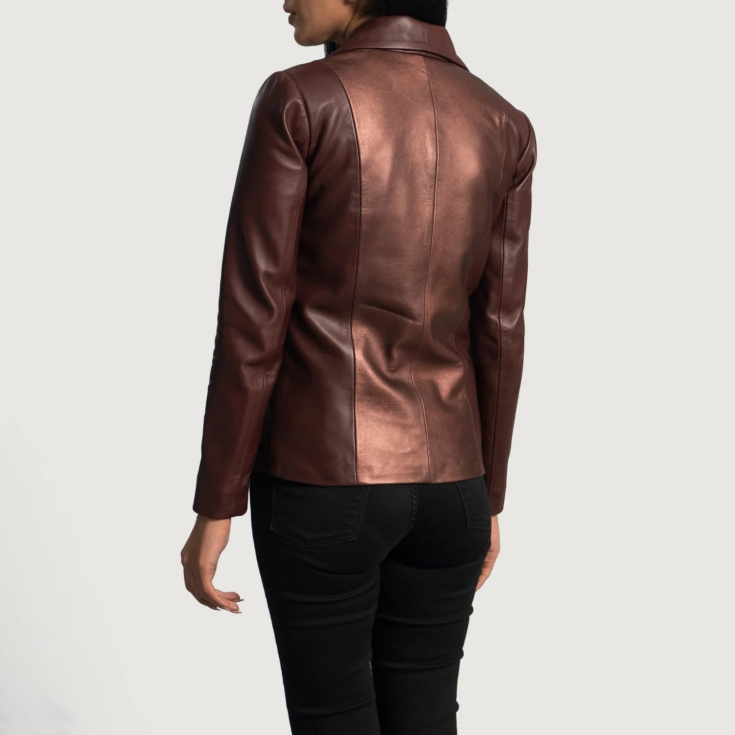 Back view of a woman wearing a Ruby Metallic Maroon Leather Blazer with long sleeves