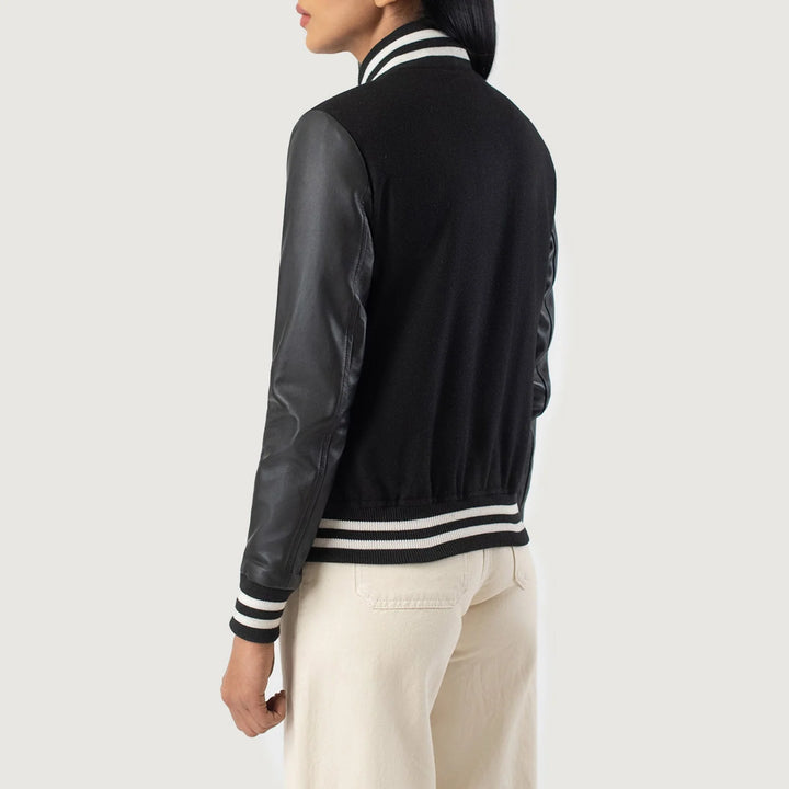 Back view of Savant Black Hybrid Varsity Jacket by Lush Gear with black leather sleeves and striped cuffs