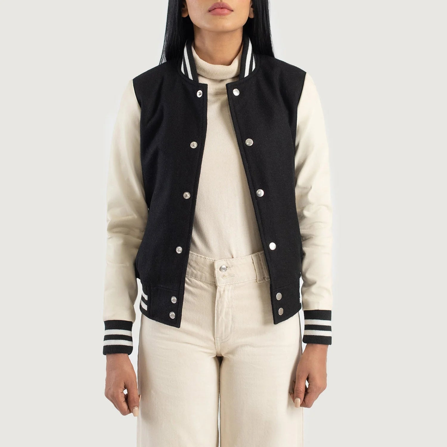 Savant Black & White Hybrid Varsity Jacket by Lush Gear featuring black body and white sleeves with striped cuffs and collar