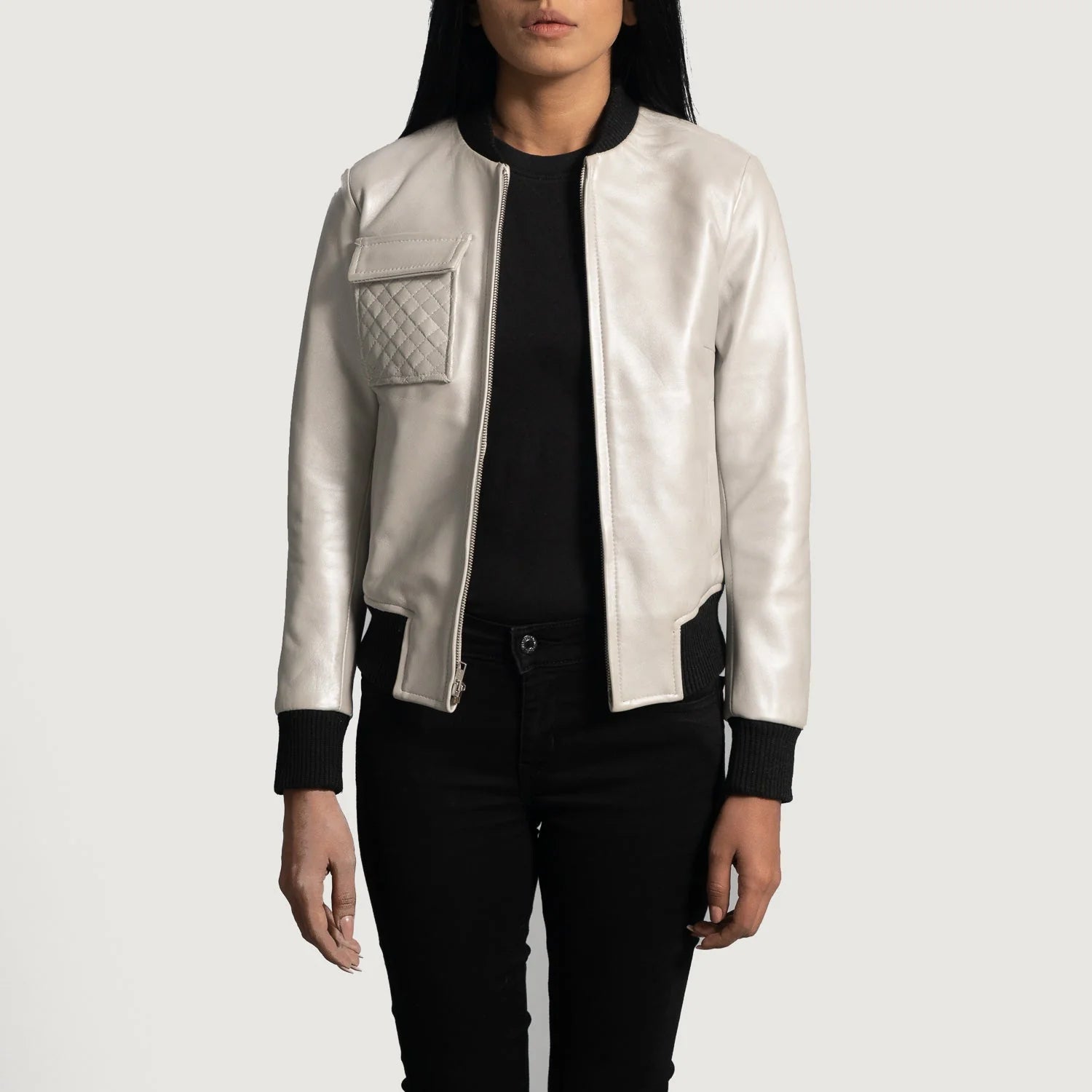 Lush Gear silver leather bomber jacket with quilted pocket and black ribbed cuffs modeled by woman