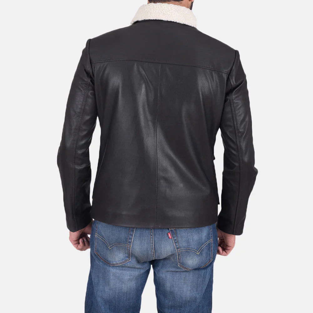 Back view of Snow Cole Black Leather Jacket with white shearling collar worn by a man