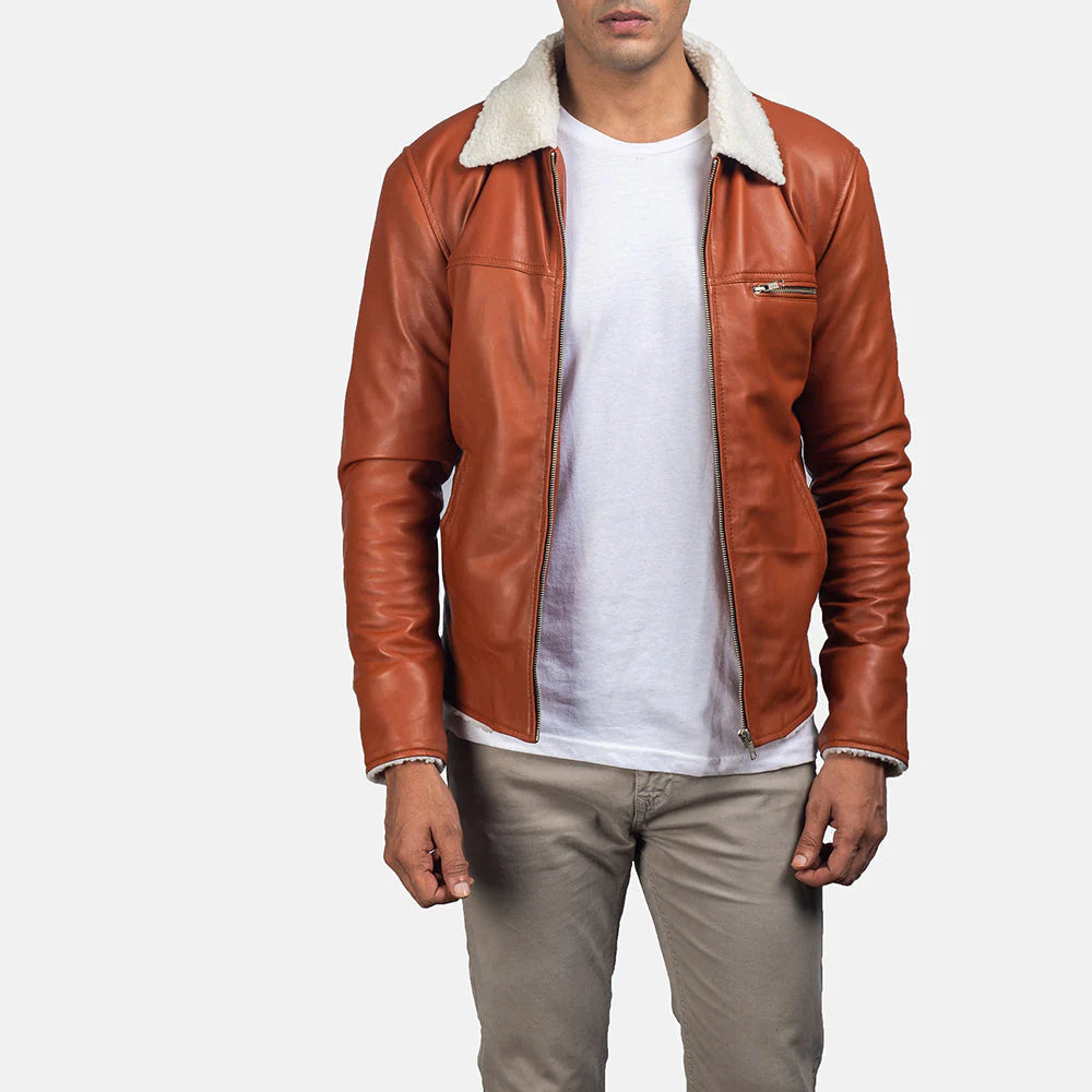 Lush Gear tan shearling leather jacket with white shearling collar worn over white t-shirt and gray pants