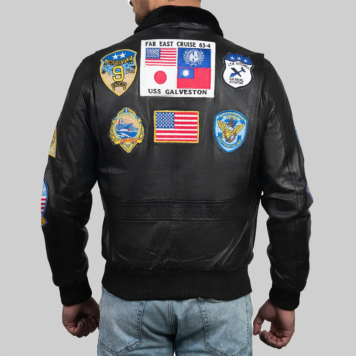 Lush Gear Top Gun Maverick bomber jacket in black leather with multiple aviation patches on the back