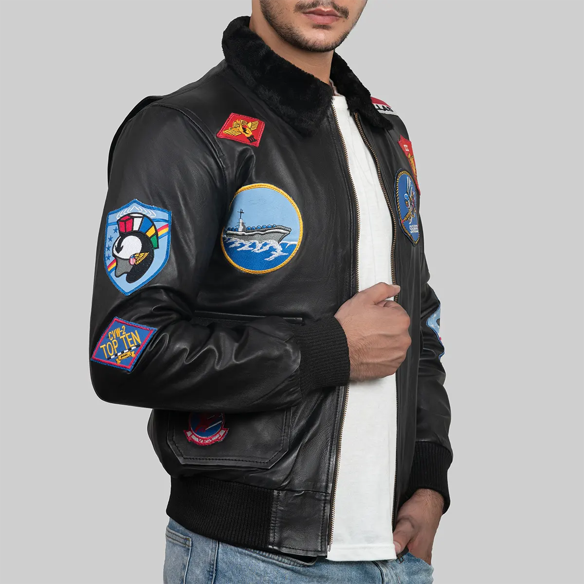 Lush Gear Top Gun Maverick bomber jacket in black leather with colorful military patches and fur collar