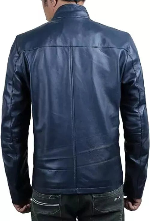 Back view of vintage blue leather motorcycle jacket by Lush Wear worn by a man with black pants