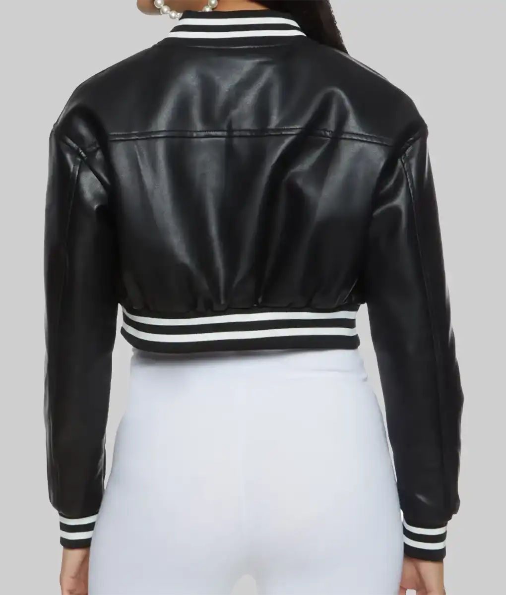 Back view of women's black leather varsity jacket with striped cuffs and waistband by Lush Gear