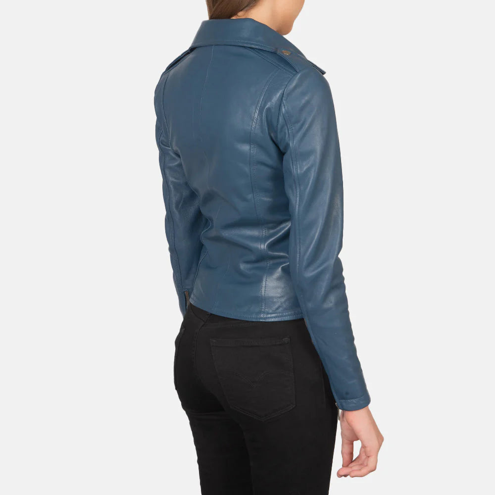 Back view of a woman wearing women's blue moto jacket by Lush Gear with fitted design and long sleeves
