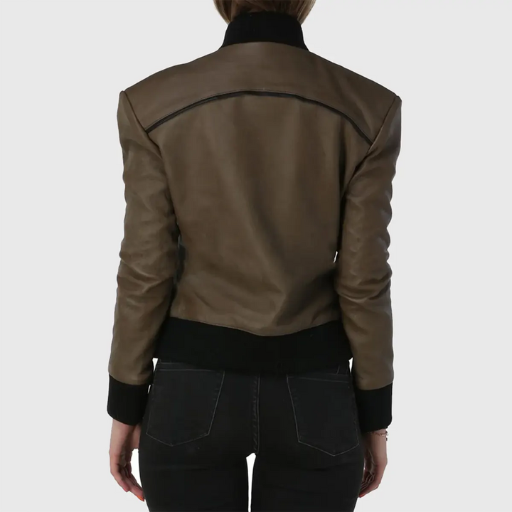 Back view of a women's brown bomber leather jacket by Lush Gear with black cuffs and waistband