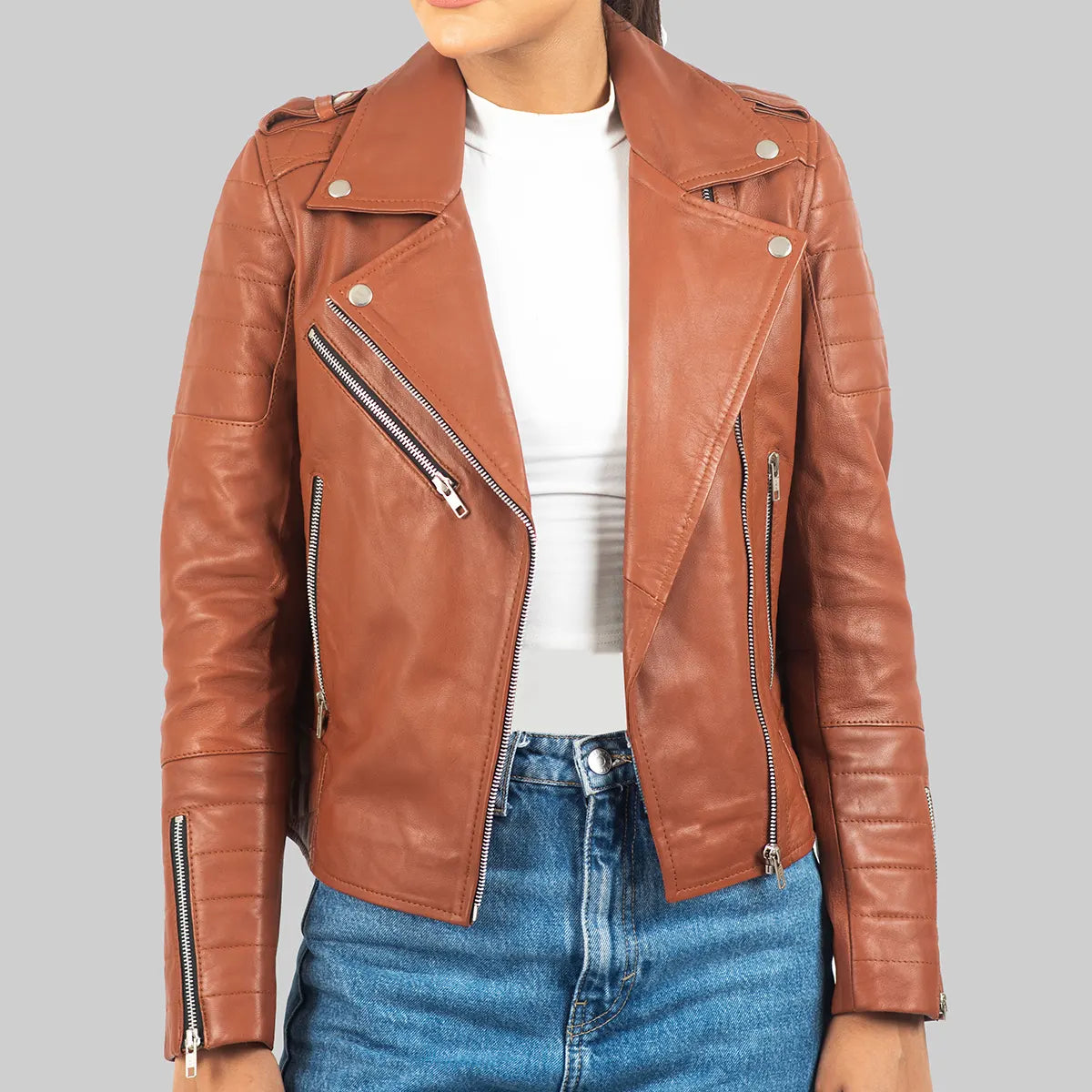Lush Gear women's brown leather biker jacket with zipper pockets and silver hardware