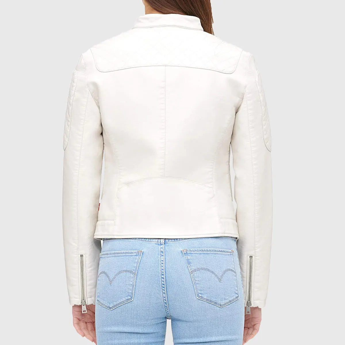 Back view of women's cafe racer moto jacket in white by Lush Gear paired with light blue jeans