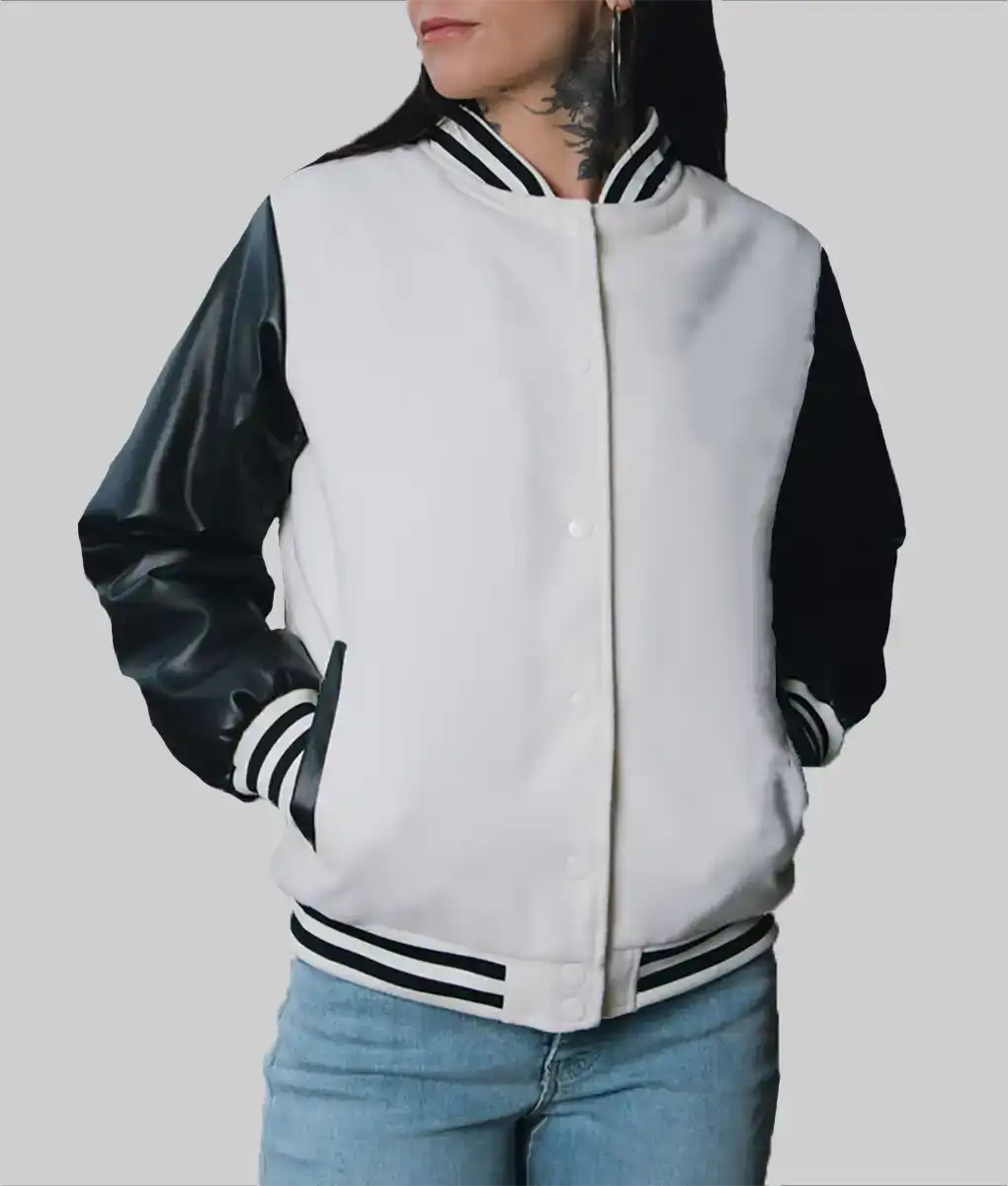 Lush Gear women's leather varsity jacket with white body and black leather sleeves styled with blue jeans
