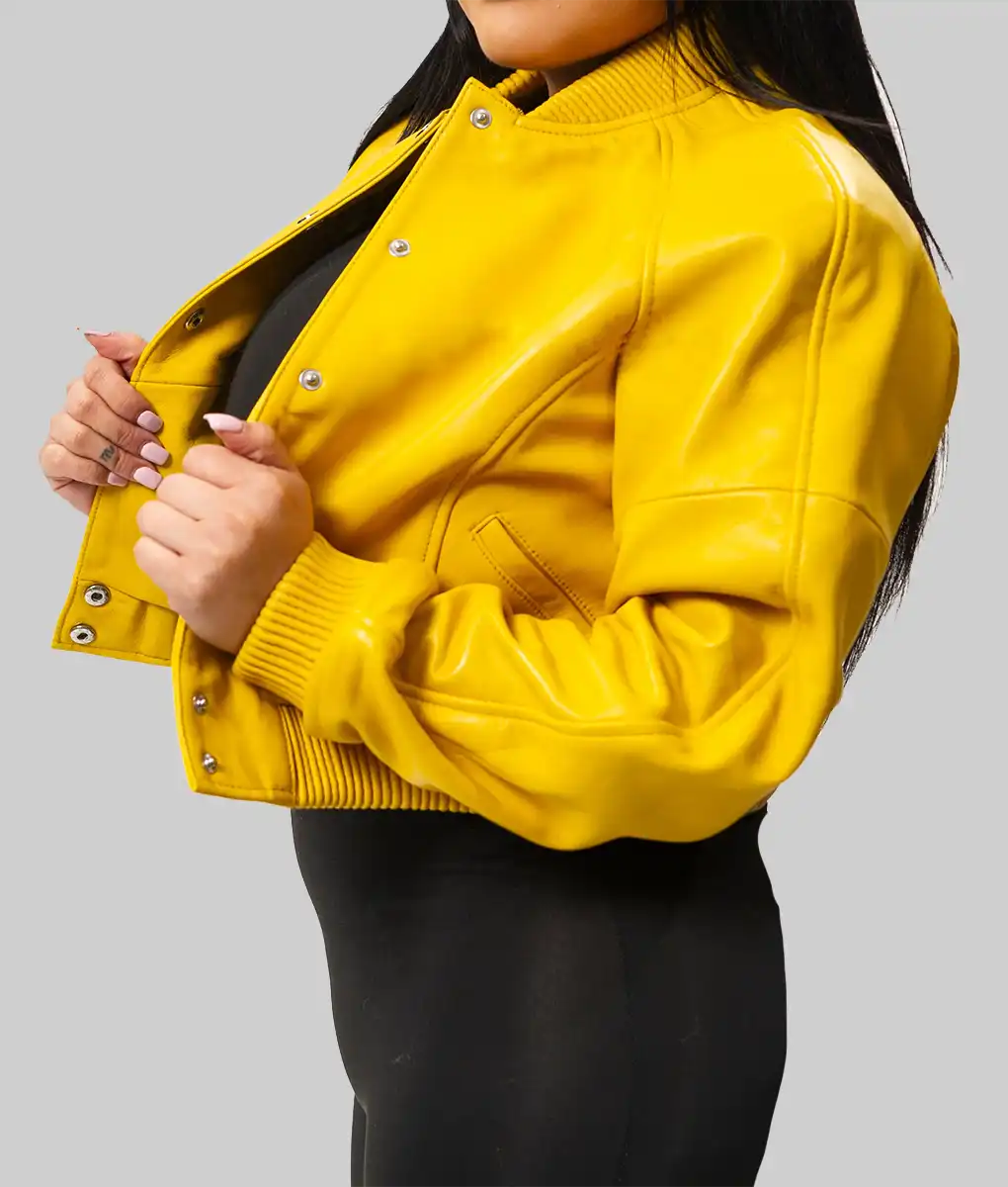 Lush Gear yellow varsity jacket for women styled with snap buttons and ribbed collar and cuffs