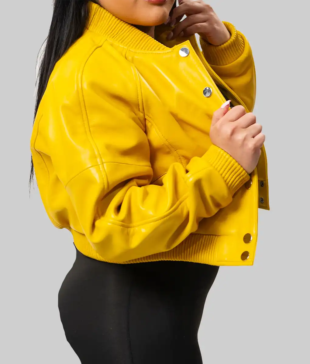 Yellow varsity jacket for women by Lush Gear with ribbed cuffs and snap button closure